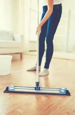 woman mopping a floor