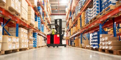 forklift with driver in a big box retail store