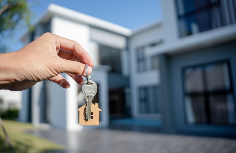 Military family receiving keys to a new home