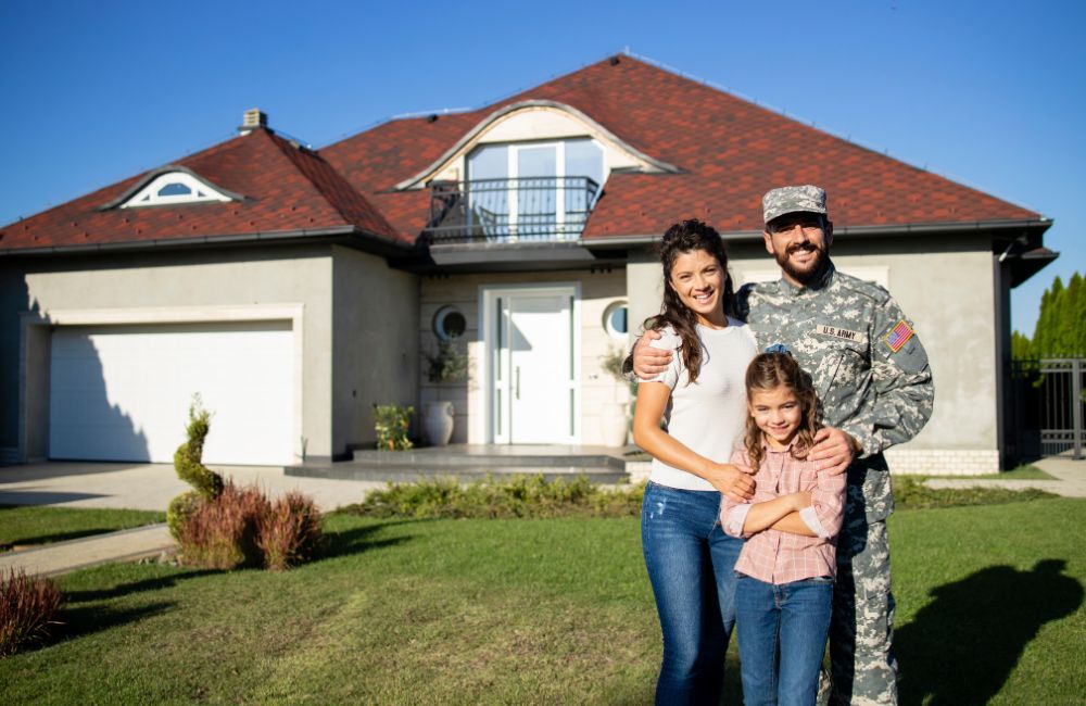 Military family receiving keys to a new home using VA loan